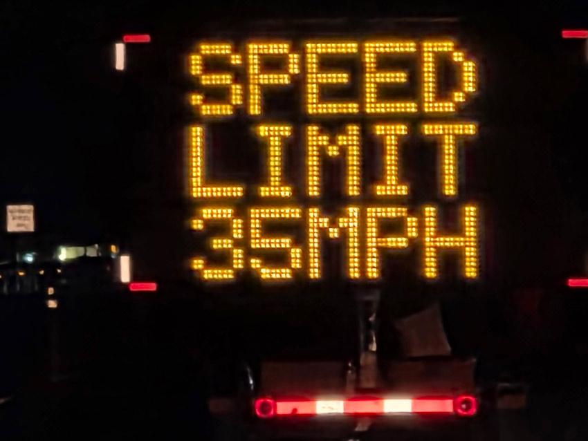 speed limit sign showing 35 mph in the dark