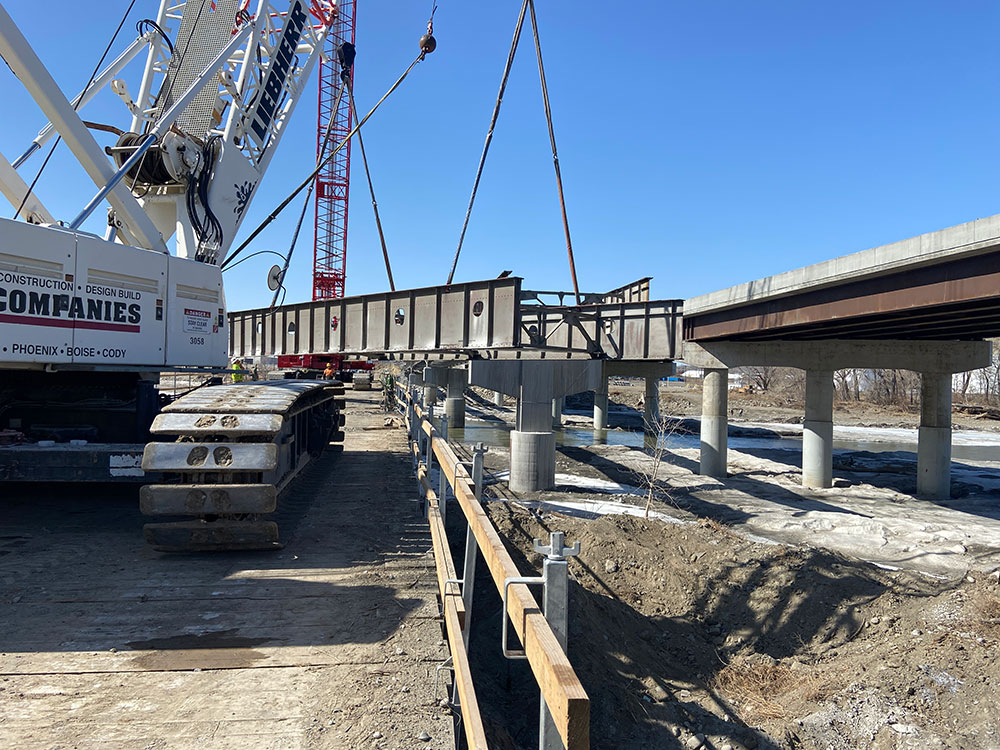 Eastbound bridge demolition continues. In this photo, crews are removing the existing steel girders.