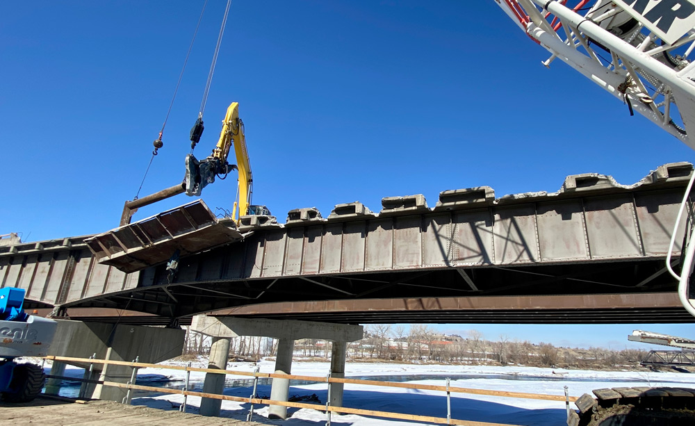 Removal of the existing eastbound bridge continues