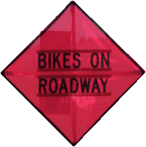 bikes on roadway sign